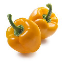 Yellow bell peppers isolated on white background composition