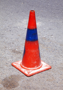 Red And Blue Traffic Cone On Road