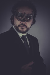 Obraz premium CEO, Portrait of elegant businessman, mysterious venetian mask