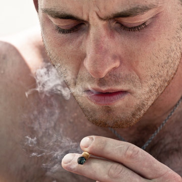 Man Smoking Hashish Joint