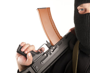 Man in mask with gun