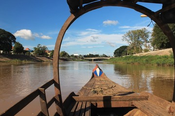 View of the river from the bow of a Cambodian boat