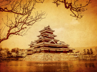 Matsumoto castle in old paper background, Japan