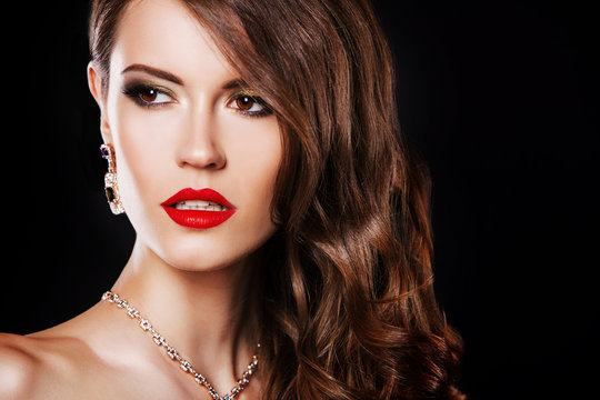 close up portrait of beautiful brunette woman with luxury