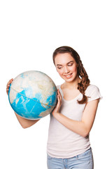 beautiful smiling young lady holding a world globe. isolated on