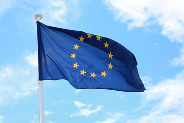 European Union flag against blue sky