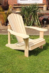 A handmade Adirondack style chair made out of old recycled wood