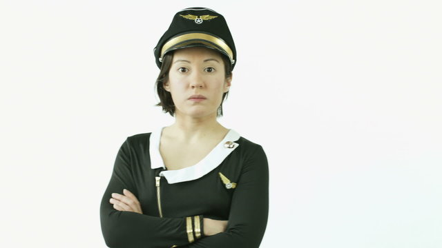 air hostess isolated on white upset arms crossed