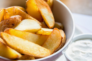 Fried potato wedges