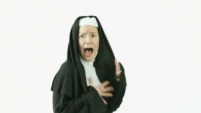 caucasian nun isolated on white scared frighten screaming