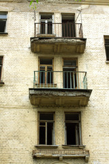 Fototapeta na wymiar Abandoned uninhabited house before renovation front view