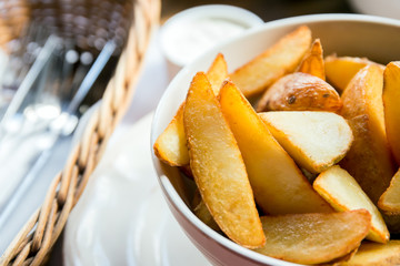 Fried potato wedges