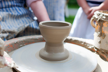 Pottery - formation process of the clay dish with traditional me