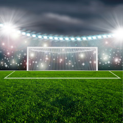 Soccer ball on green stadium arena
