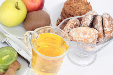 Fruit, juice and cookies.