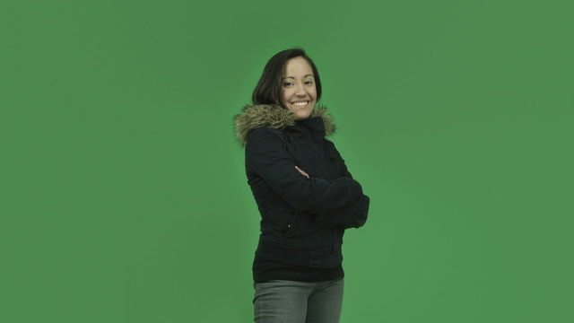 caucasian girl with winter jacket isolated on green screen