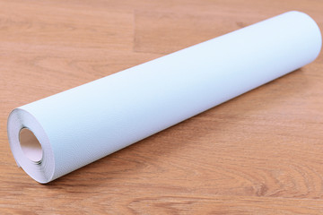 Wallpaper on wooden floor