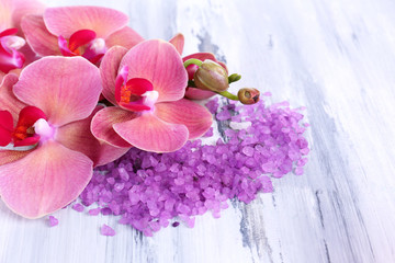 Spa treatments on color wooden background