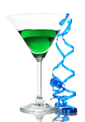 Glass of cocktail and streamer after party isolated on white