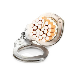 Addition concept with cigarettes and handcuffs