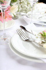 Table setting with spring flowers close up