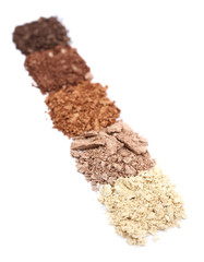 Crushed eyeshadow isolated on white