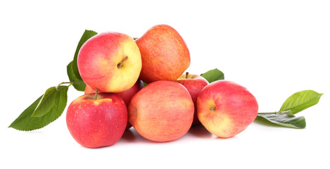 Ripe sweet apples with leaves, isolated on white