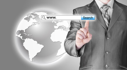 Businessman pushing virtual search bar