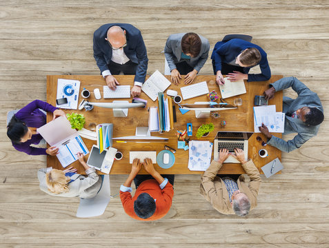 Multi-Ethnic Group of People Working Together - Powered by Adobe