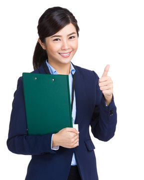 Business woman holding clipboard and thumb up