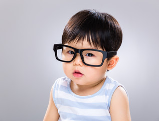 Child boy with glasses