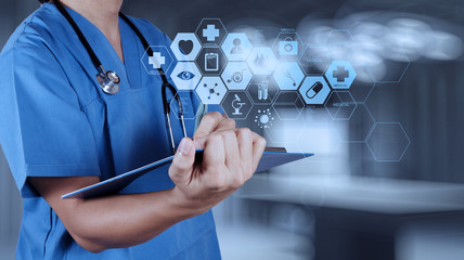 Medicine doctor hand working with modern computer interface as m
