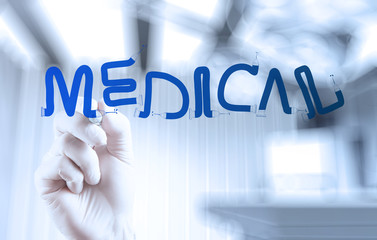 Medicine doctor hand drawing medical word  as medical concept