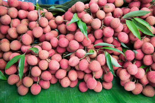 pile of lychee for sale in local market