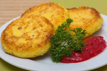 Sweet cheese pancakes on a plate