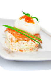 Salad with boiled vegetable, spicy salmon and egg on plate,