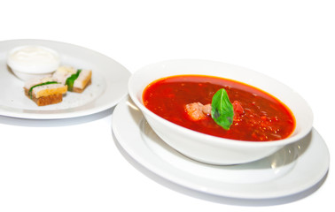 Borsch, red beetroot soup in white plate, menu restaurant