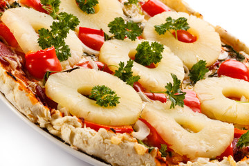 Pizza Hawaii on white background
