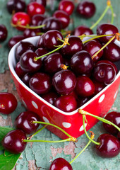cherries in a heart-shaped bowl