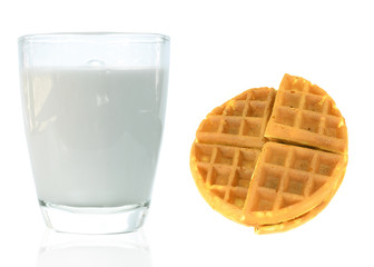 a round waffle on milk