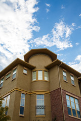 Plaster Condo Under Nice Skies