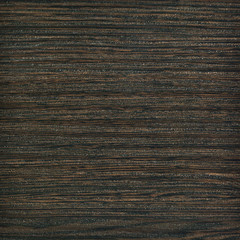 Fototapeta premium Wood texture background of dark veneer featuring fine horizontal grain pattern and rich black brown color tone for modern interior design background or surface panel mockups