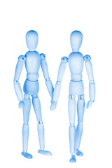 Two blue wooden little men, homosexual couple