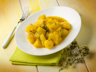 potatoes salad with saffron and oregano