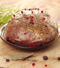 Raw ham in marinade