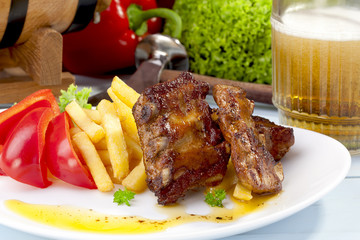 Grilled ribs on plate