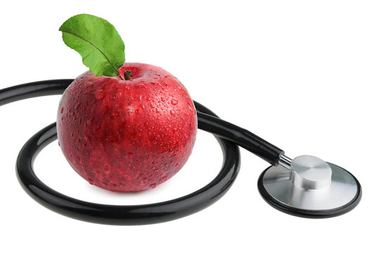 apple and stethoscope isolated on white background