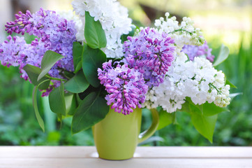 Bouquet of lilac on a natural background