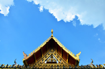 Roof Thai Style with Sky and Clouds Background