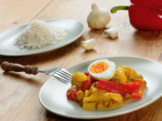 South African curry with vegetables, fruit and eggs